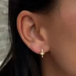 Eye Creolen aus 585er Gold mit funkelndem Schutzsymbol – stilvolle Eleganz mit spiritueller Bedeutung.