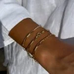 Link und Tennis-Armband aus 585er Gold mit filigranen Gliedern & funkelnden Zirkonia – stilvolle Eleganz für besondere Anlässe.