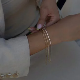 Tennisarmband aus 585er Gold mit funkelnden Zirkonia-Steinen – elegantes Schmuckstück für stilvolle Looks.