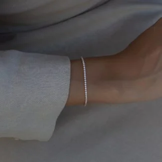 Tennis Armband aus 585er Gold mit funkelnden Zirkonia-Steinen – elegantes Schmuckstück für stilvolle Looks.