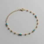 Türkis Orbs Armband aus 585er Gold mit schützendem Türkis & funkelndem Zirkonia – stilvolles Schmuckstück für positive Energie & Eleganz.