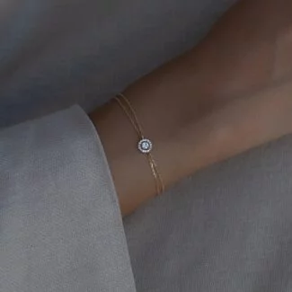 Golden Halo Armband aus 585er Gold mit funkelndem Zirkonia in Halo-Fassung – stilvolle Eleganz für besondere Anlässe.