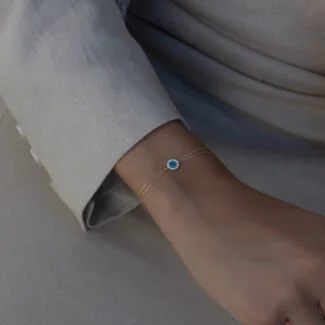 Halo Evil Eye Armband aus 585er Gold mit funkelndem Schutzauge in Halo-Fassung – stilvoller Schutzschmuck für positive Energie & Eleganz.