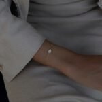 Hand der Fatima Armband aus 585er Gold mit Hamsa-Hand Anhänger & Zirkonia – stilvoller Schutzschmuck mit spiritueller Bedeutung.