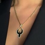 Phönix-Anhänger mit schwarzen Akzenten aus 585er Gold mit Clip-Verschluss – ein stilvolles Symbol für Transformation & Stärke.
