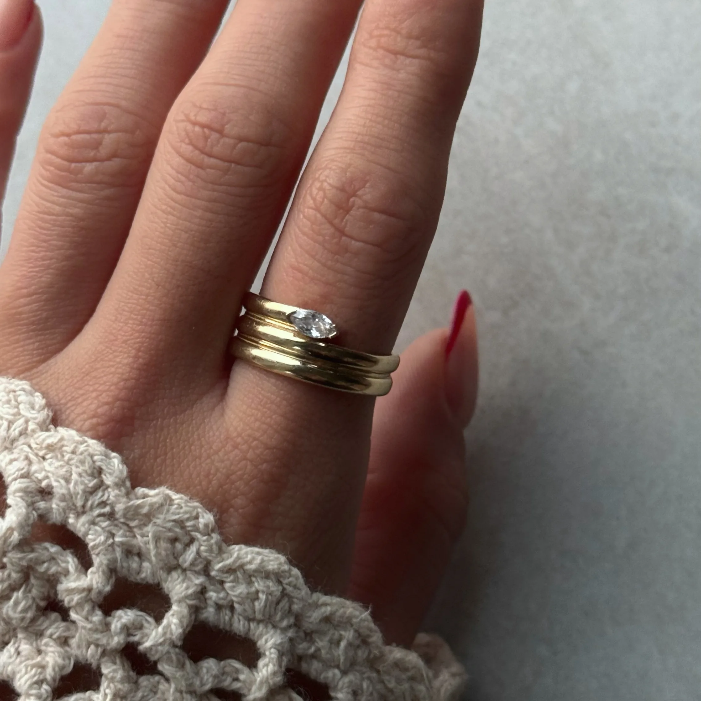 FullSizeRender 45 Marquise Wickelstack Ring aus 585er Gold mit elegantem Wickeldesign & funkelndem Zirkonia – ein stilvolles Schmuckstück mit moderner Raffinesse.