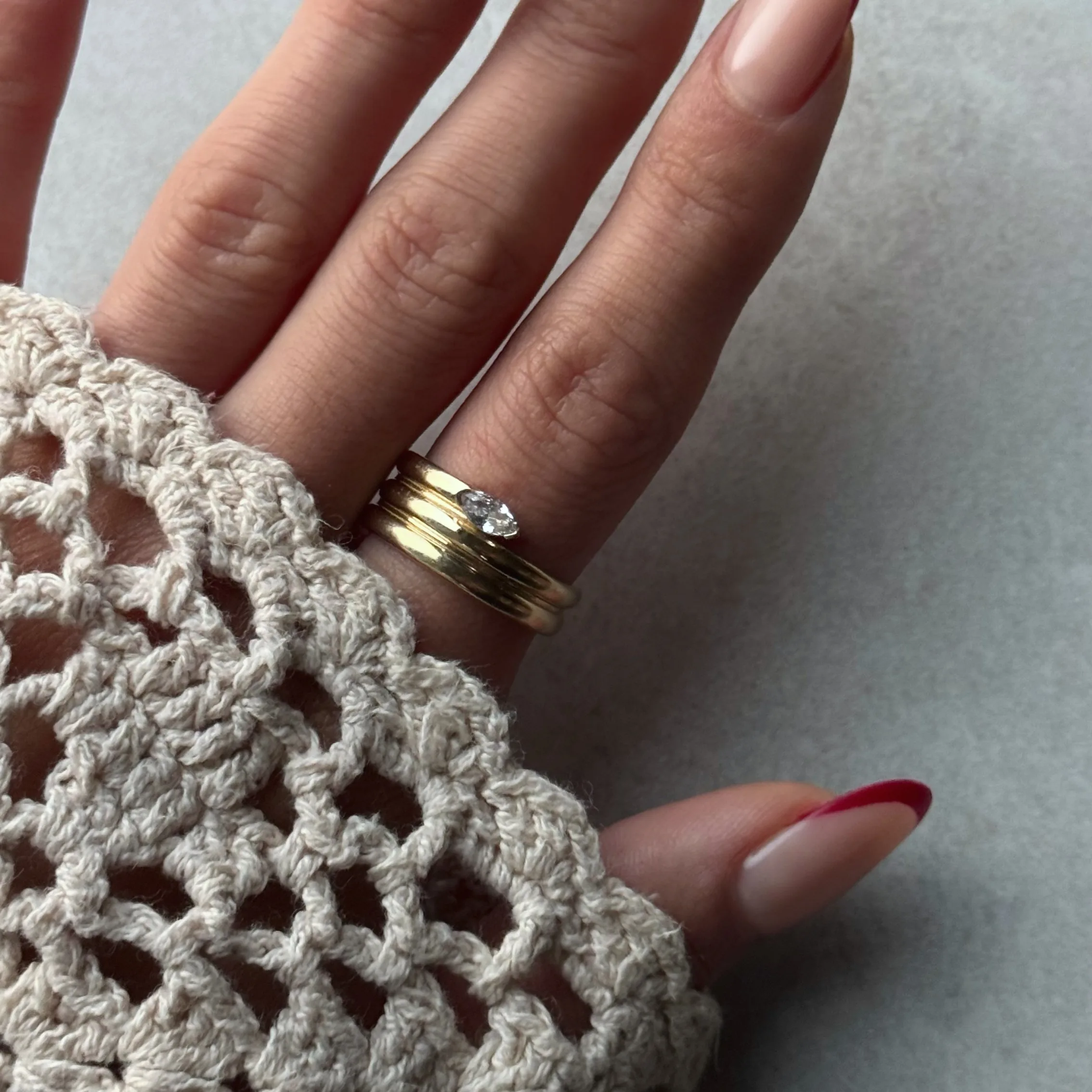FullSizeRender 46 Marquise Wickelstack Ring aus 585er Gold mit elegantem Wickeldesign & funkelndem Zirkonia – ein stilvolles Schmuckstück mit moderner Raffinesse.