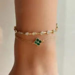 Kleeblatt Armband mit grünen Zirkonia-Steinen auf 585er Goldkette