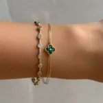 Kleeblatt Armband mit grünen Zirkonia-Steinen auf 585er Goldkette